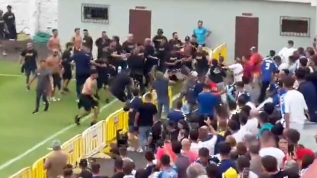 Polisi mulai beraksi karena sekitar 100 hooligan bentrok dengan penggemar saingan sebelum bentrokan Spanyol
